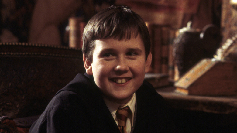 Neville smiling