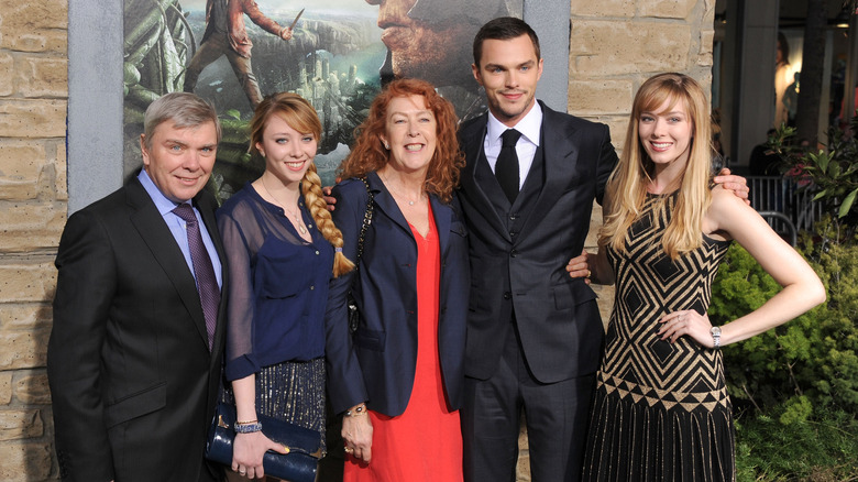 Hoult and his family on the red carpet