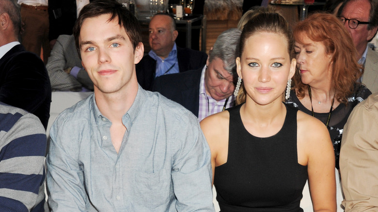 Nicholas Hoult and Jennifer Lawrence sit together