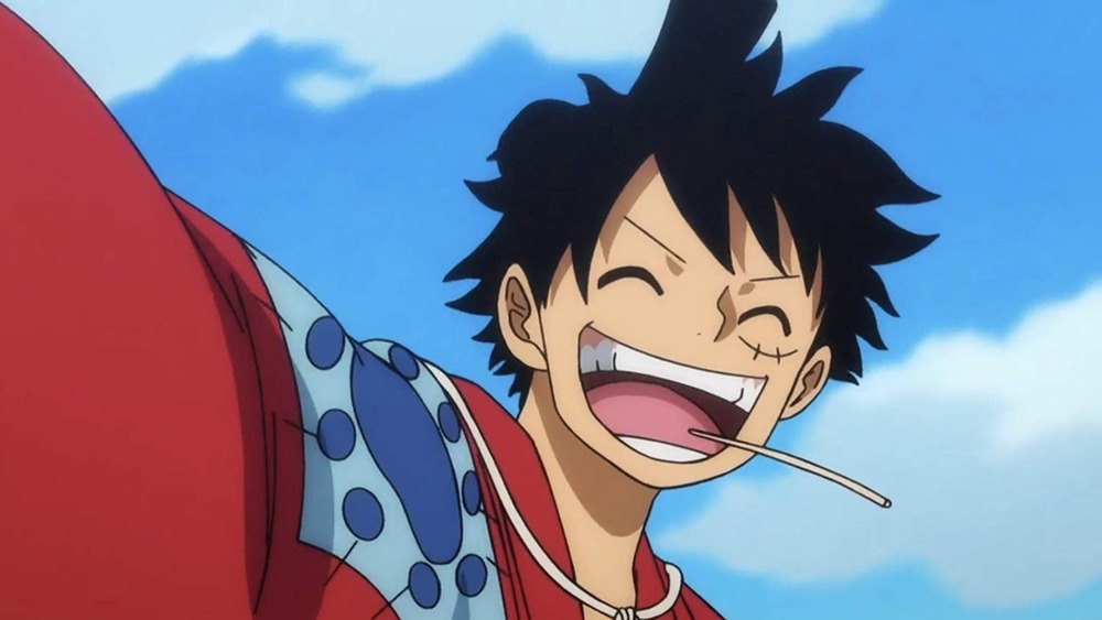 Luffy laughing with straw in mouth