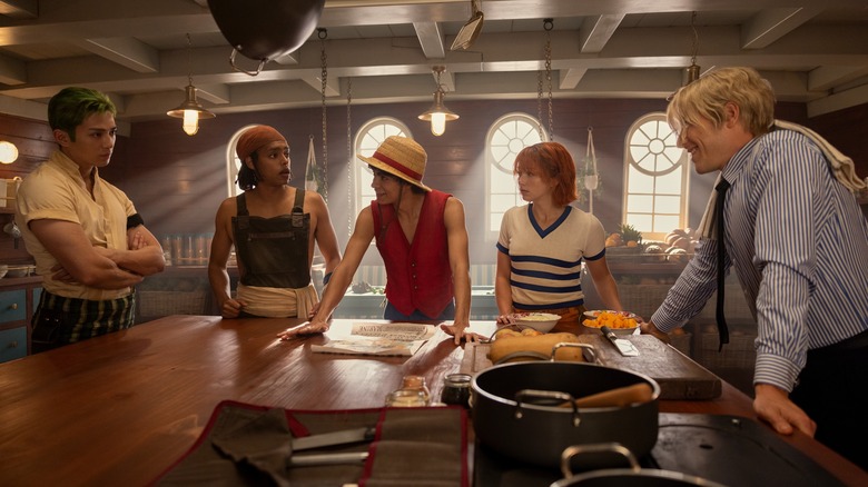 Straw Hat Crew talking around table