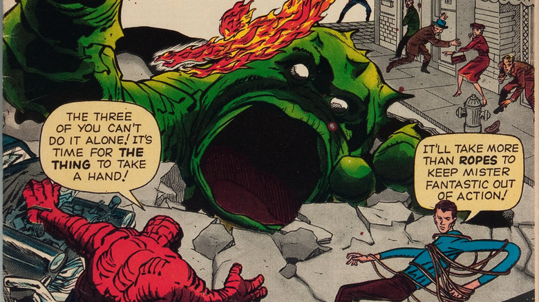 Fantastic Four fighting giant monster