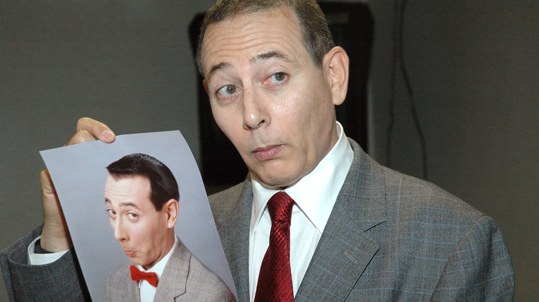 Paul Reubens holding Pee-wee photo