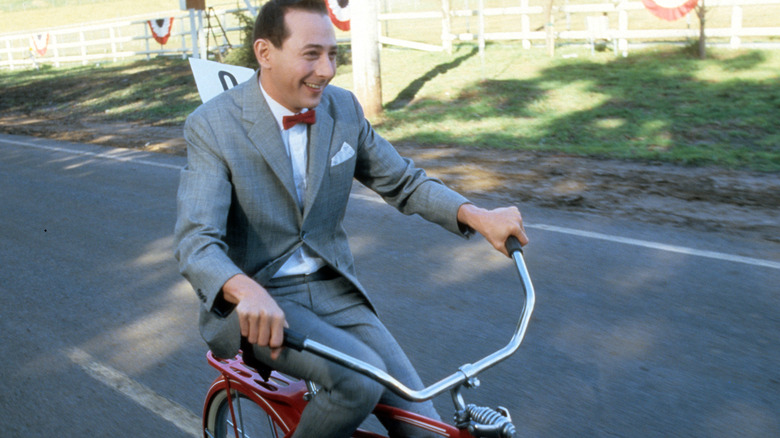 Pee-wee riding his bike