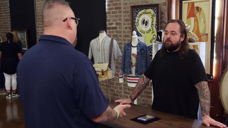 Chumlee talking to a man