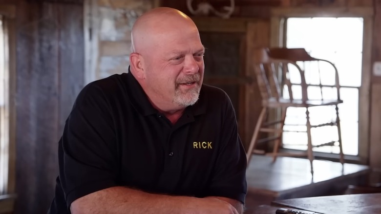 Rick Harrison leaning on a counter