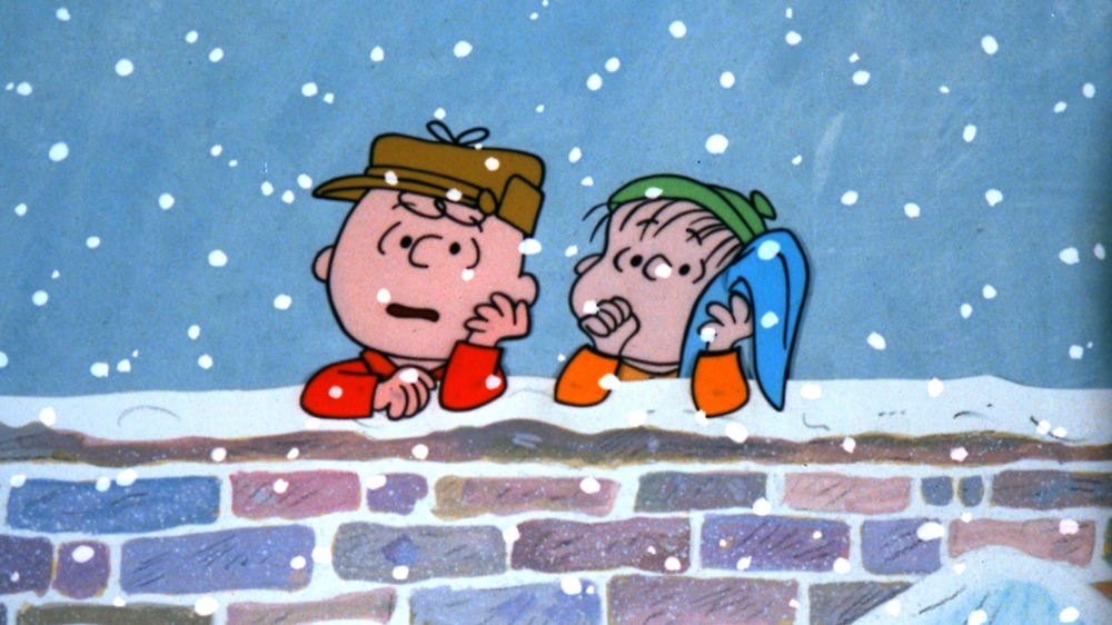 Charlie Brown and Linus leaning