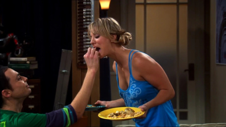 Sheldon feeding Penny