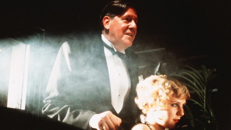 Edward Herrmann showing Kirsten Dunst a movie