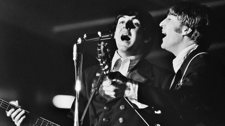 Paul McCartney and John Lennon singing together