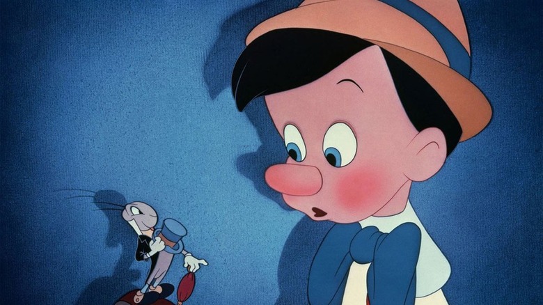 Pinocchio looking at Jiminy Cricket