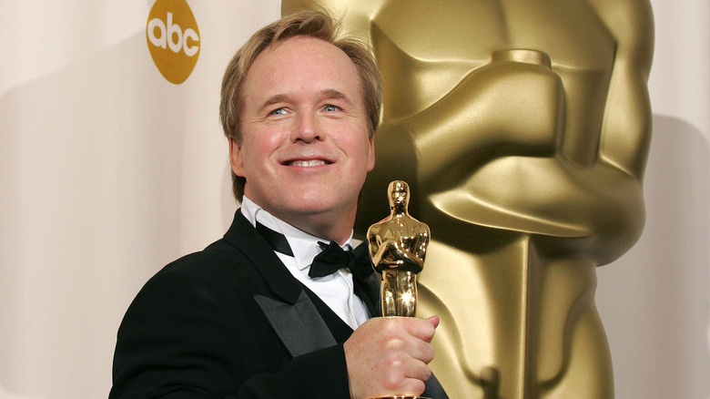 Brad Bird holding an Oscar