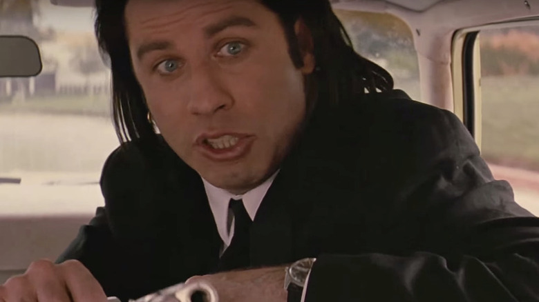 Vincent Vega holding gun