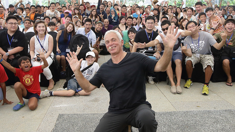 Jeremy Wade posing with fans