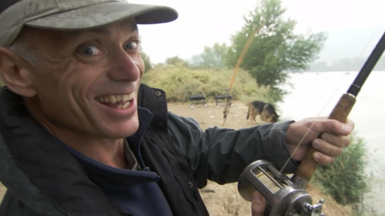 Jeremy Wade fishing and smiling