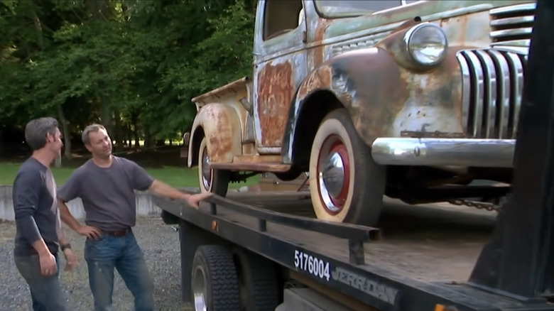 Robbie and Mike looking at vintage truck