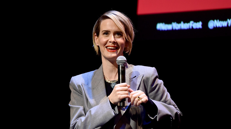 Sarah Paulson smiling with microphone