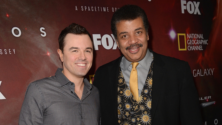 Seth with Neil DeGrasse Tyson at a premiere for Cosmos: A Spacetime Odyssey