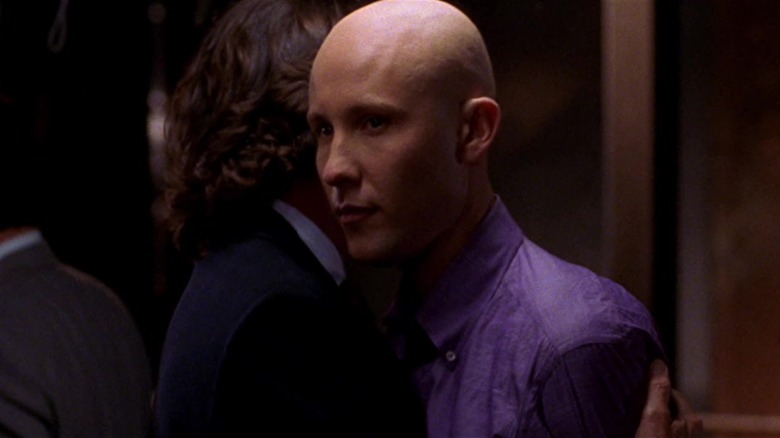 Lionel Luthor hugs Lex Luthor