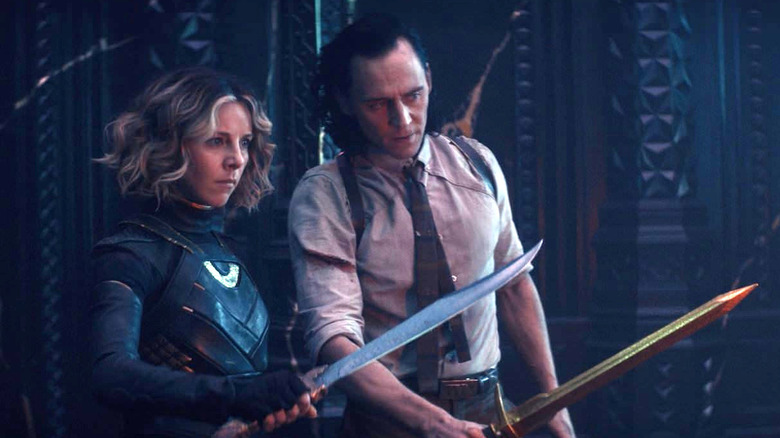 Loki and Sylvie with swords