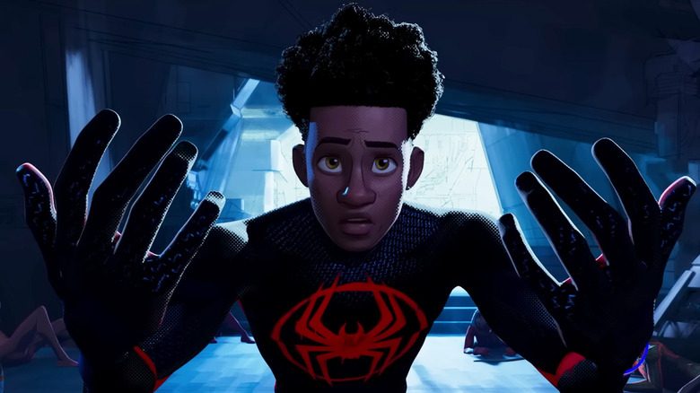 Miles Morales holding up hands