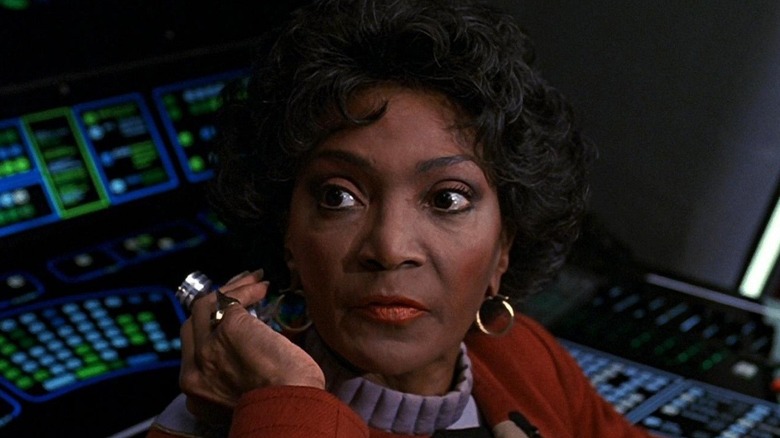 Uhura listens to Klingon transmission