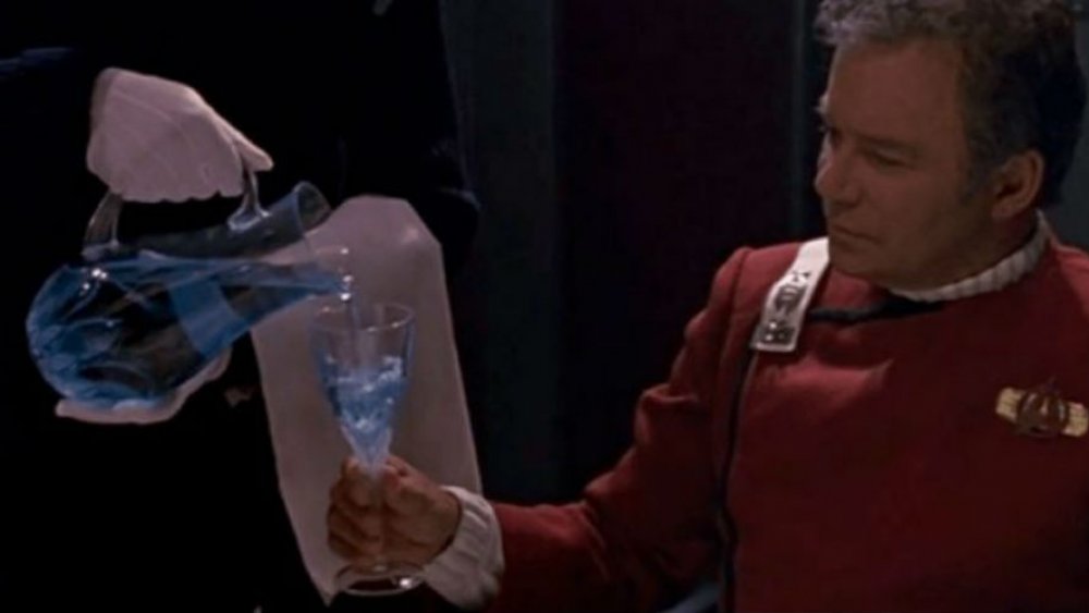 Captain Kirk being served Romulan Ale in Star Trek VI: The Undiscovered Country