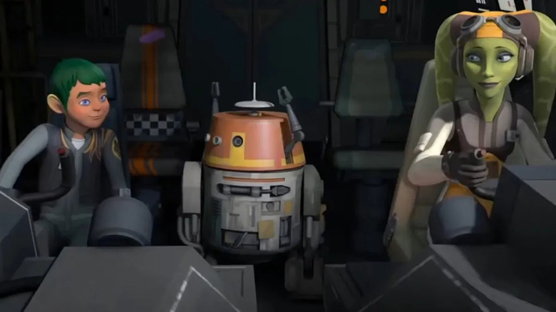 Hera, Jacen, and Chopper in cockpit