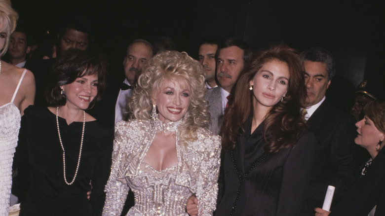 Field, Parton, and Roberts on red carpet