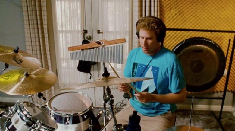 Brennan playing drums