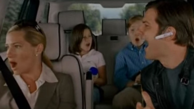 Derek, Alice, and kids singing in car