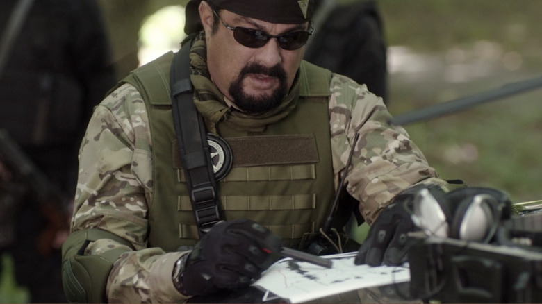 Cartels' Steven Seagal loading gun 