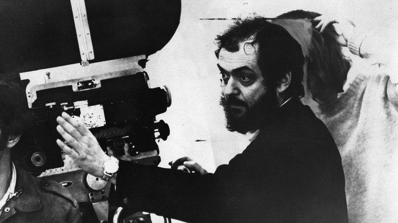 Stanley Kubrick holding camera