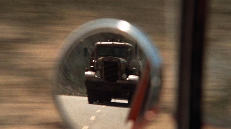 Duel truck in rearview mirror