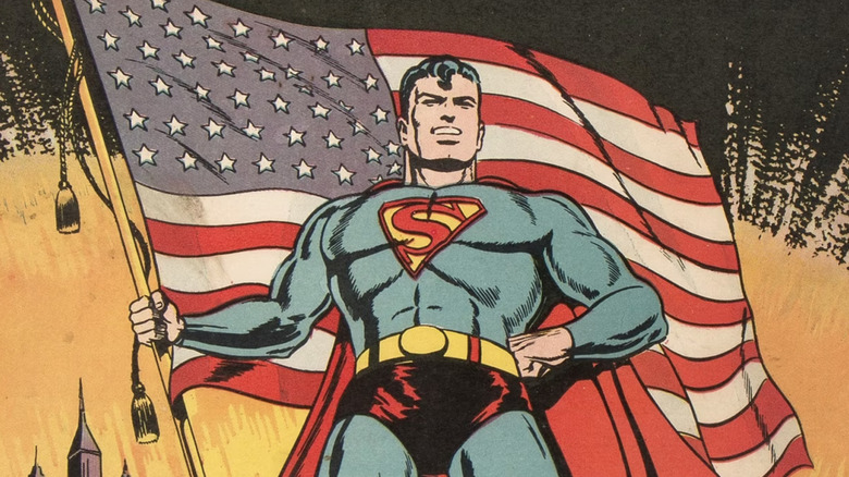 Superman holds an American flag