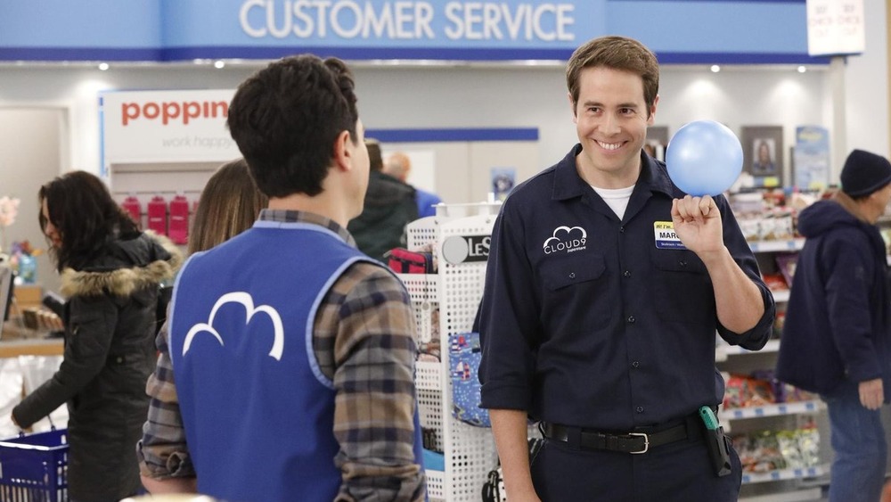 Marcus holding balloon in Superstore