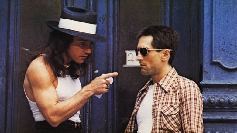 Harvey Keitel pointing a finger at Robert De Niro