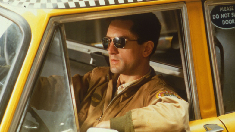 Robert De Niro driving a taxi