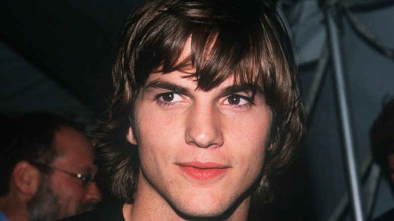 Ashton Kutcher smirking