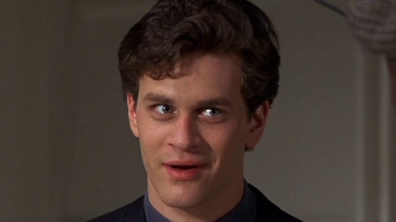 Tom Everett Scott with his mouth slightly open