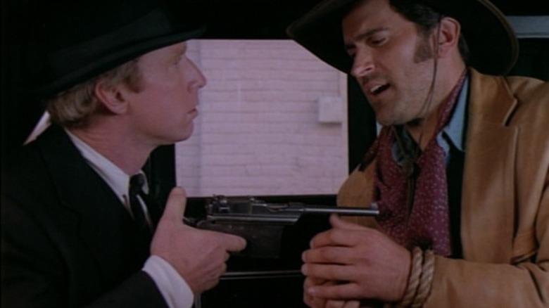 Brisco held at gunpoint