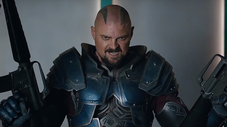 Skurge holds two guns