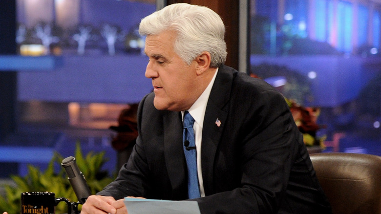 Jay Leno talking at desk