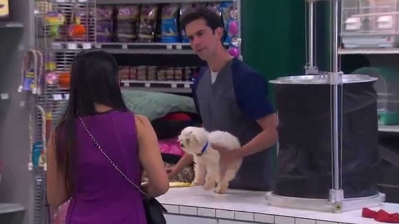 Carbonaro holding a dog