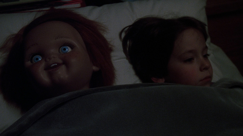 Chucky and Andy in bed