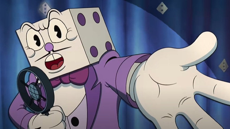 King Dice gesturing