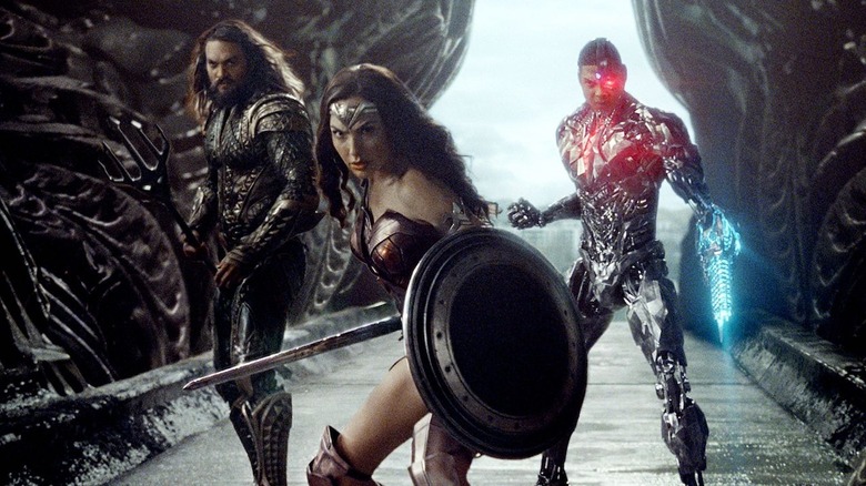 Aquaman, Wonder Woman, and Cyborg charging into battle