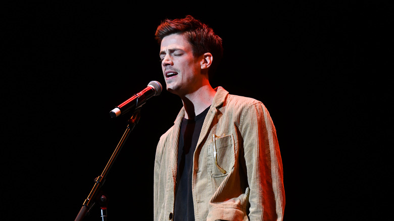 Grant Gustin performing a song