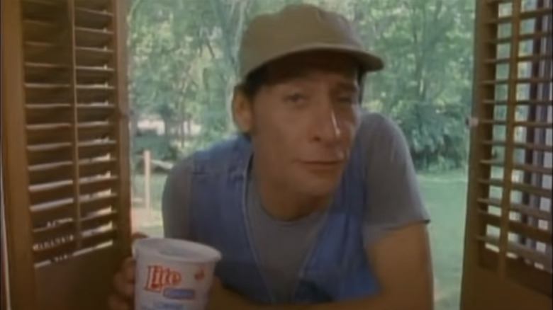 Ernest holds soda