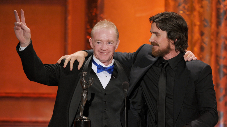 Dicky and Christian accepting an award